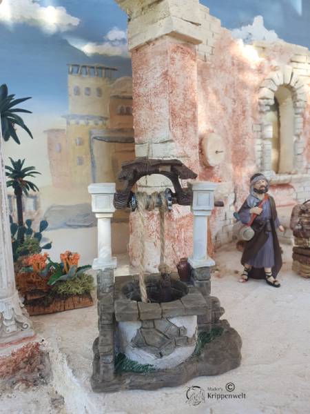 ein orientalischer Brunnen als Krippendekoration
